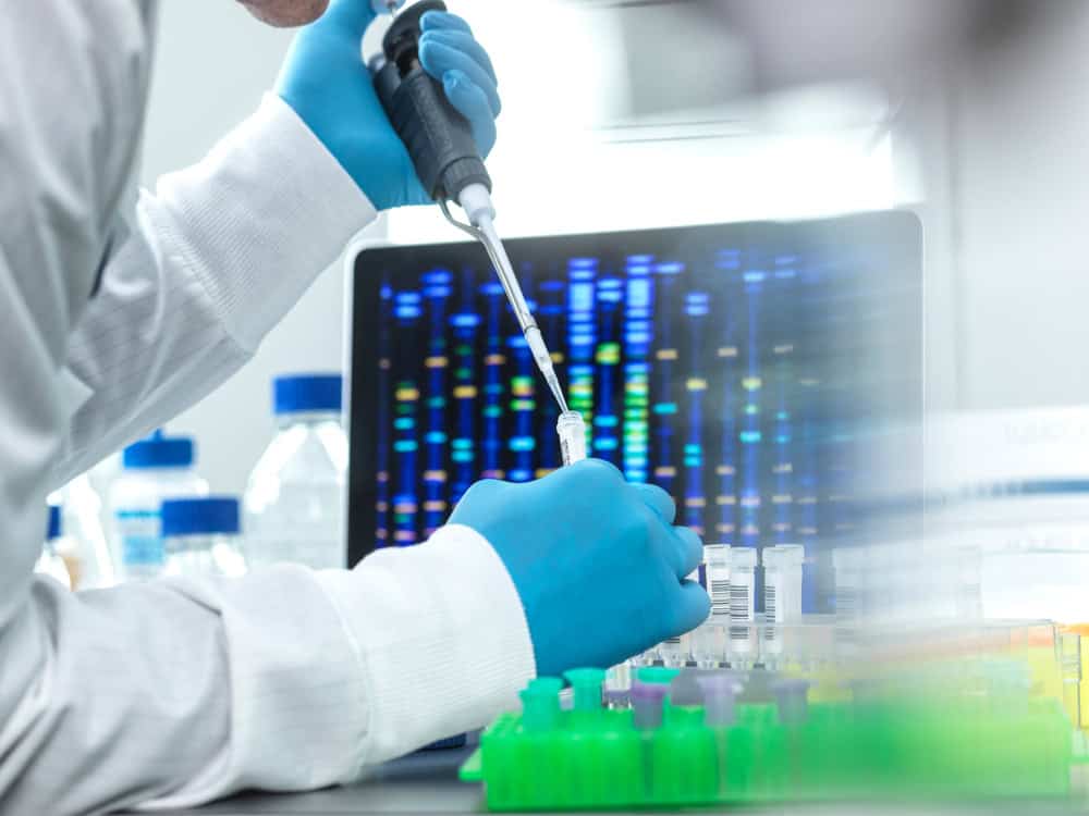 A lab technician conducting PGT-A testing in Thailand