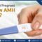 A woman with low AMH holding a positive pregnancy test