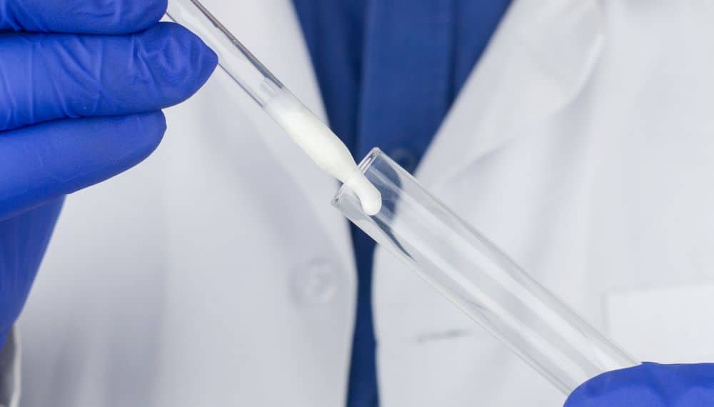 Semen sample placed inside a tube in preparation for MACS sperm test