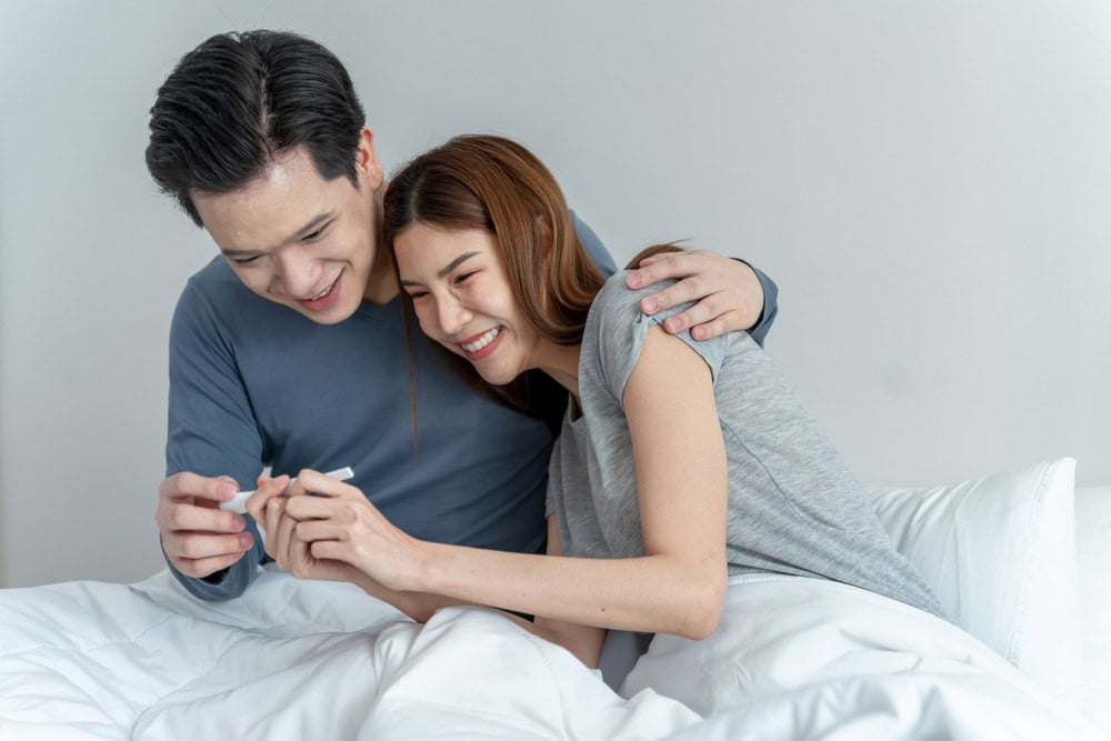 Couple planning a safe pregnancy after receiving preimplantation genetic testing results.